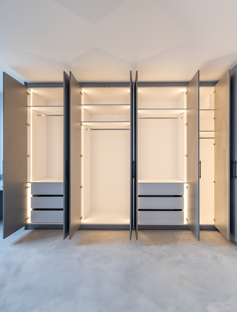 open wardrobe with lighting inside.